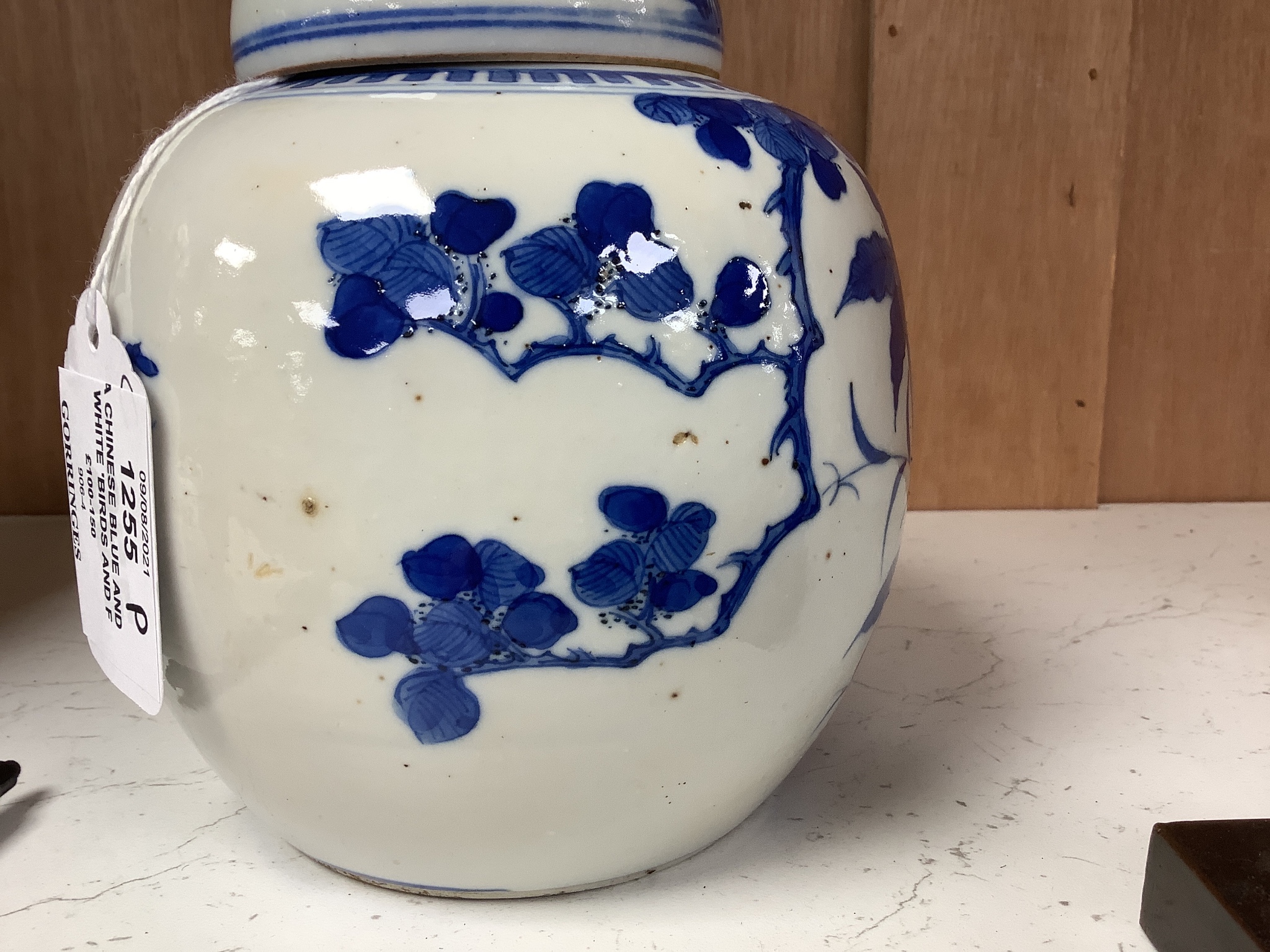 A Chinese blue and white 'birds and flowers' jar and cover, Kangxi mark, c.1900, height 15cm
